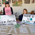 Local Scientist Talks Climate ChangeTCCL volunteers get ready for an event Tri-Cities schools
